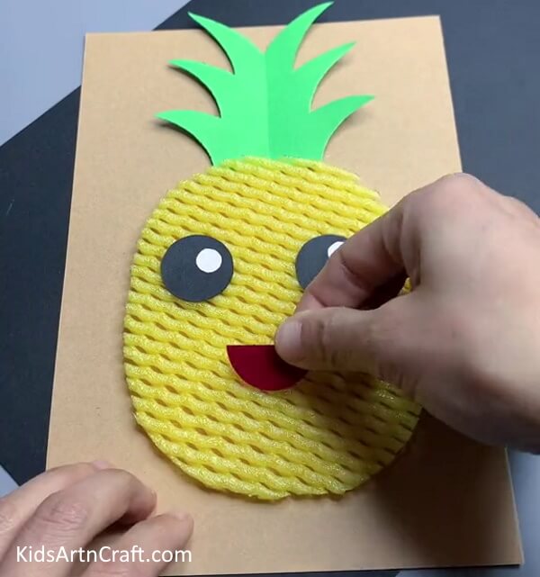 Adding Smile On Pineapple - Carving a Pineapple Fruit DIY Project Using Foam Netting