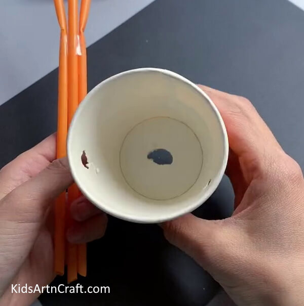 Make More Holes In a Recycled Paper Cup-An Entertaining Craft Activity for Kids Utilizing Discarded Paper Cups 