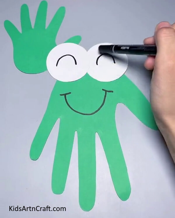 Create Eyes And a Smiling Face For The Froggy-Simple Handprint Crafting Project for Kids - Frogs on Paper 