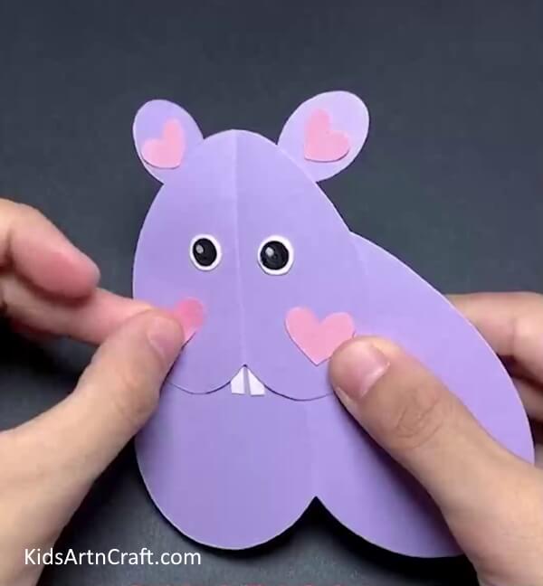 Adding More Hearts For a Little Blush-Crafting a mouse using a heart-shaped paper - a step-by-step guide.