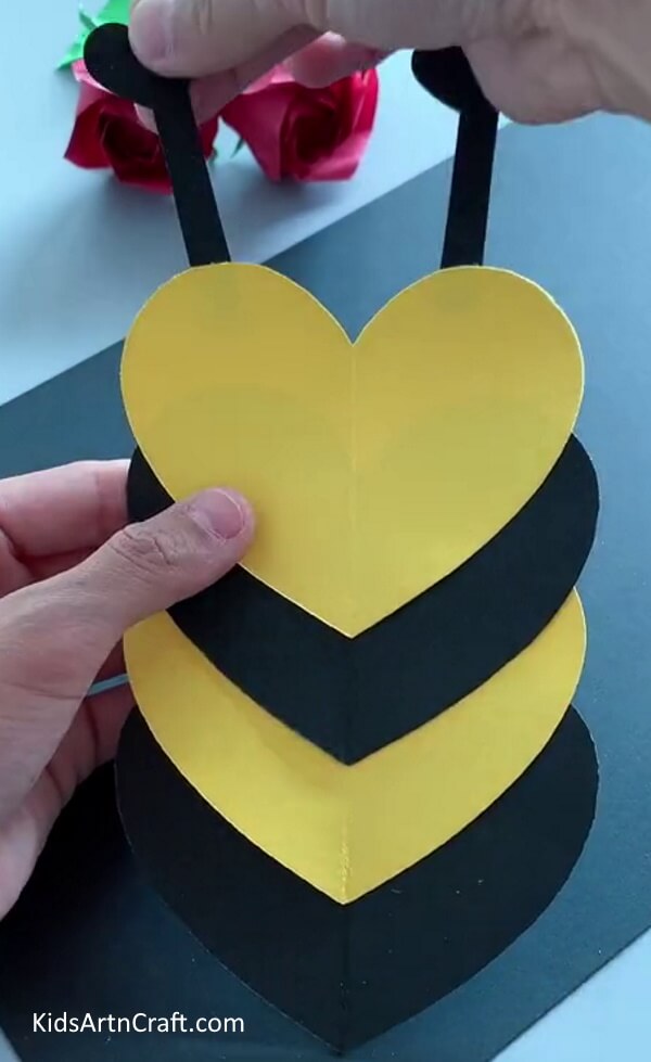 Pasting Mini Hearts On Antennas - Create a Paper-Made Heart Bee with this Guide