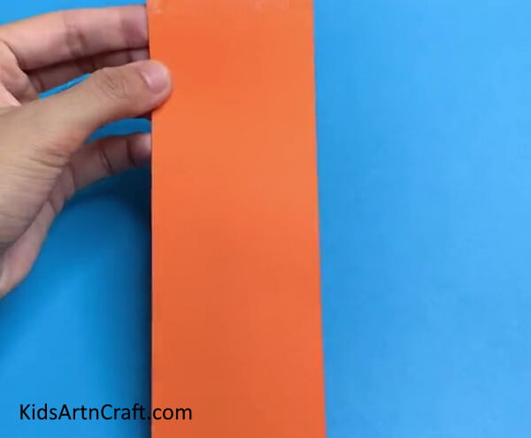 Cutting A Rectangular Strip- Learning to Construct an Adorable Fish out of Paper 