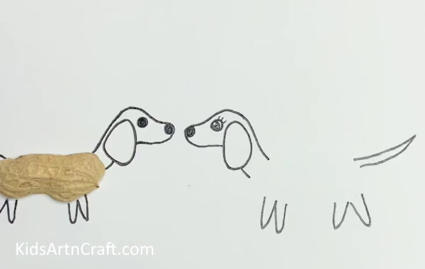 Drawing Another Dog - A simple doggy craft made with a peanut covering. 