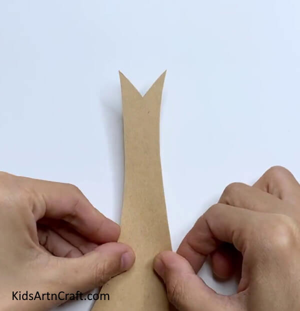 Pasting Cardboard Tree Trunk On Paper - A straightforward autumnal tree craft, constructed with reused leaves.