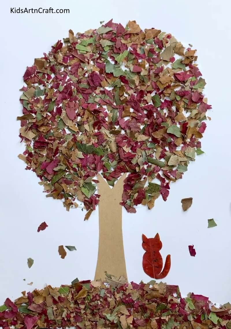 Fall Tree Craft Using Leaves Is Ready! - An effortless autumnal tree craft made from upcycled leaves.