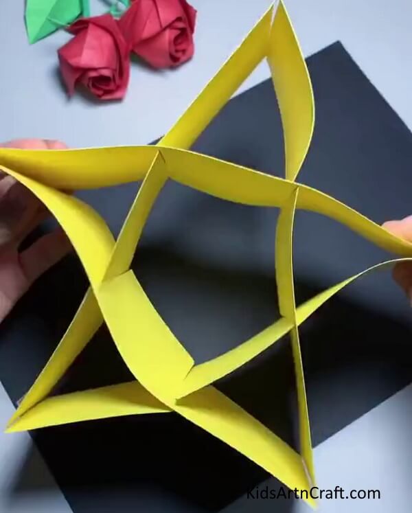 Connect All The Ends-Construct a straightforward paper star using craft paper