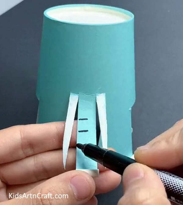 Making Markings Follow These Steps To Create an Elephant Paper Cup Craft For Children