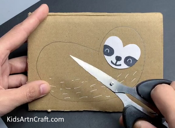 Cutting Monkey Out Of Cardboard - An Easy To Follow Tutorial For An Animal Craft That Hangs