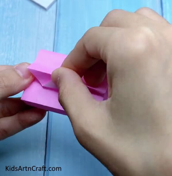 Closing The Bag - A fun project for youngsters is to DIY a small origami paper bag. 
