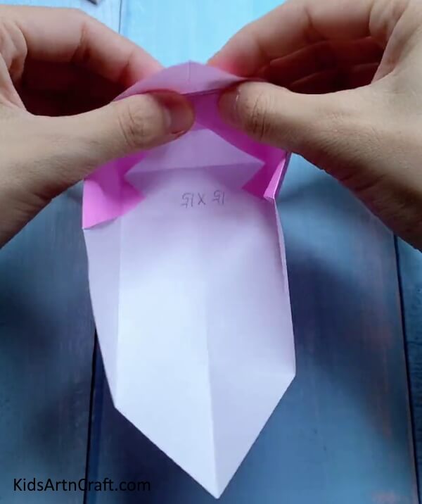 Folding Right Top Corner Inside - An origami paper bag that is small is something children can make.