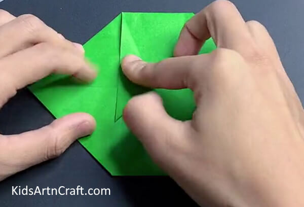 Bringing Triangle To The Crease - Paper folding to make a dinosaur