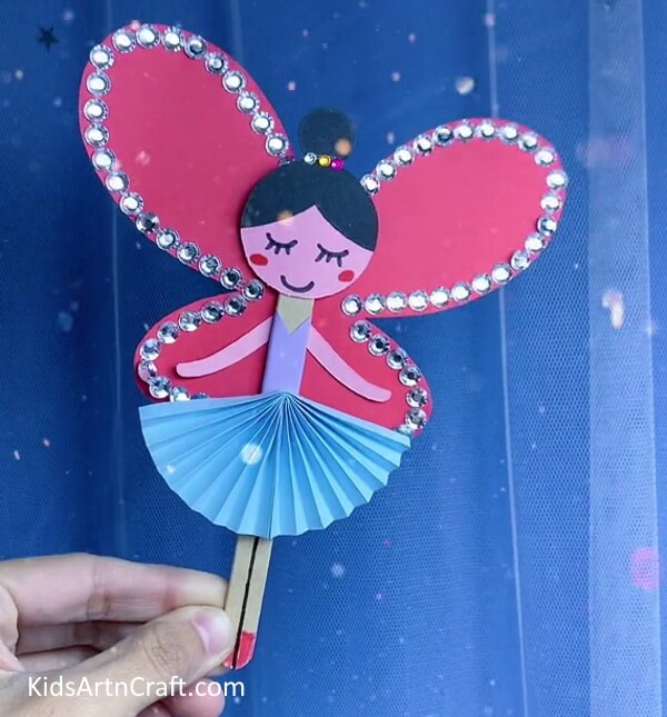 Decorate The Wings Using Beads And Other Embellishments Crafting a Paper Doll with Craft Paper 