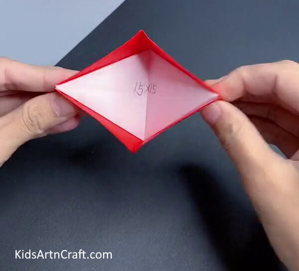 Folding the Corners-Fabricating a Paper Eye for Children at Home