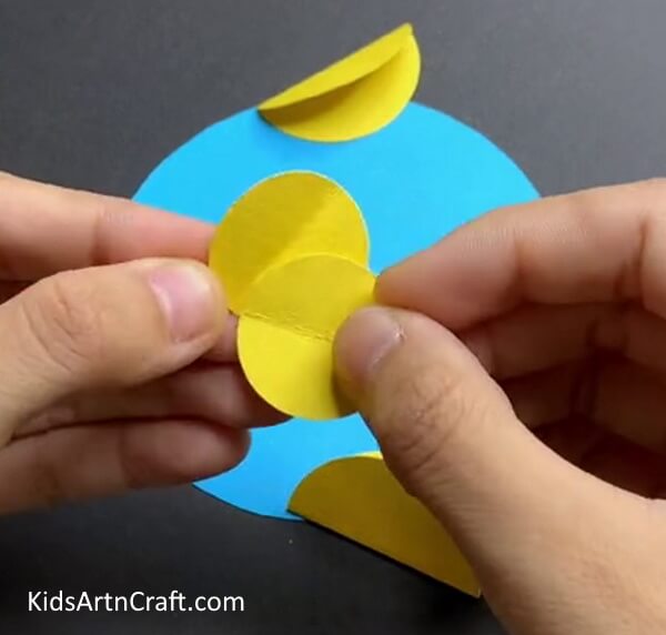 Folding Two Circles Together - A Fun Craft Project for Kids - Paper Fish