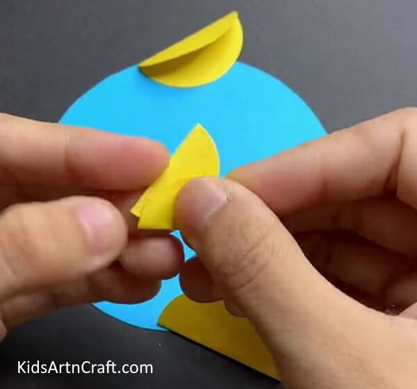 Folding Circles On Each Other - Crafting Adorable Fish Out of Paper - Fun for Kids
