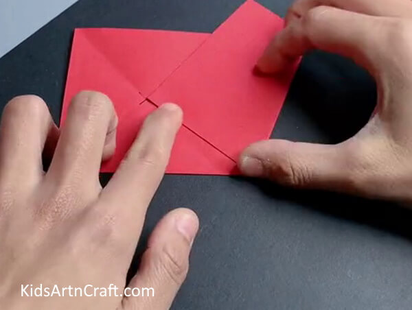 Use Folding Variations And Create a Parallelogram- A straightforward technique for forming paper snowflakes