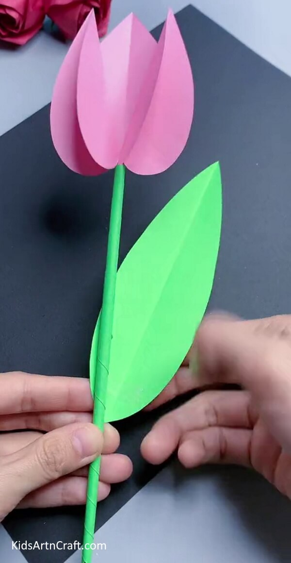 Pasting Leaf On Stem - Crafting a Paper Tulip - A Great Way to Entertain Kids 