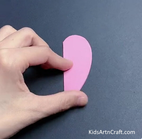 Cutting Hearts  - A simple tulip paper flower craft for children. 