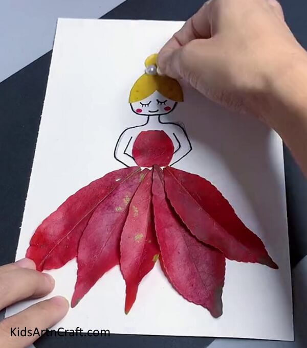 Pasting beads. Step-by-Step tutorial on how To Make fall leaf artwork for kids