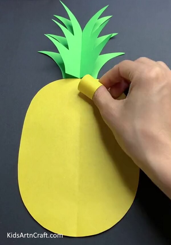 Pasting The Rolls On Pineapple - Constructing a 3D Paper Pineapple Craft with Kids