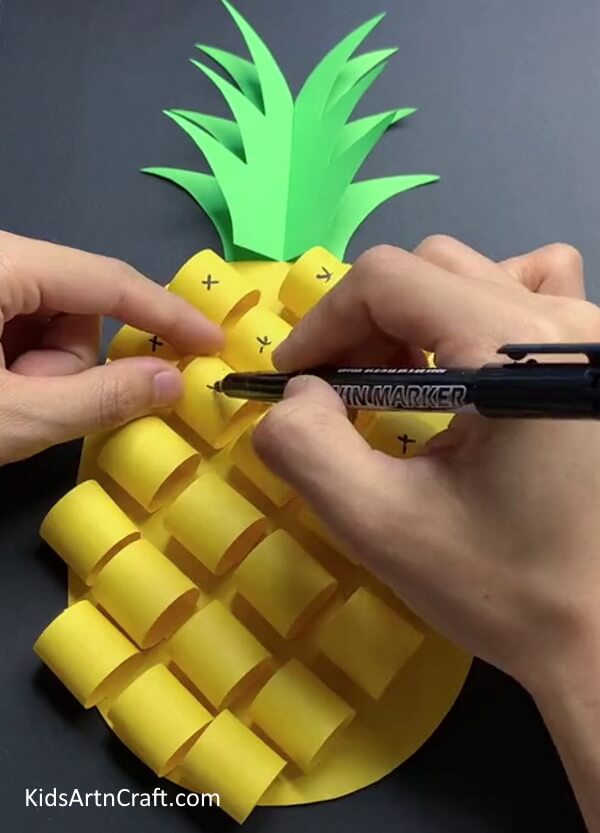 Adding Details - Making a 3D Paper Pineapple Craft with Little Ones