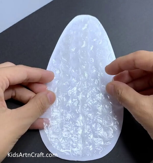 Pasting Bubble Wrap On White Paper - Step-by-Step Guide to Creating a Bubble Wrap Corn Craft