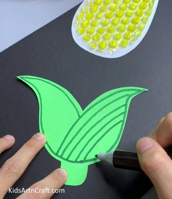 Drawing Details On Leaf - Step-by-Step Guide to Making a Bubble Wrap Corn Handicraft
