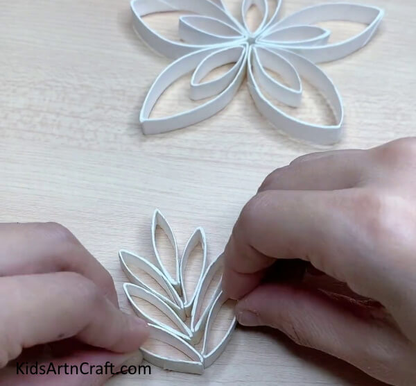 Complete The Tree Shape-This guide will show you how to make simple paper snowflakes