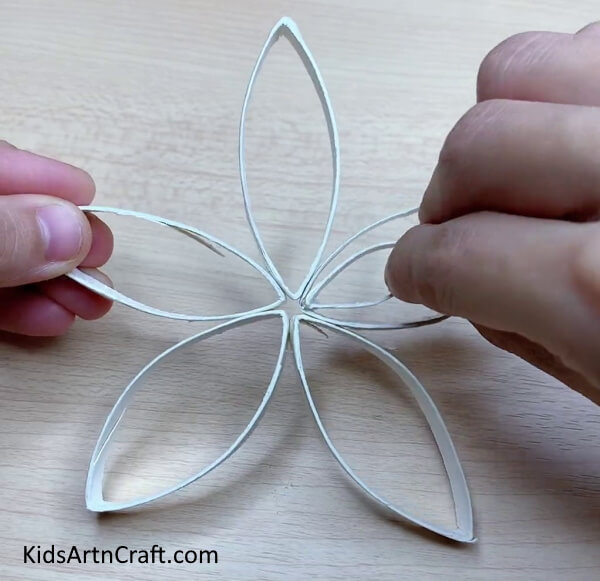 Pasting The Smaller Eye Inside The Bigger Eye-This guide will show you how to make effortless paper snowflakes