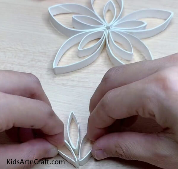 Gluing More Pieces Together-Learn how to craft simple paper snowflakes with this tutorial 