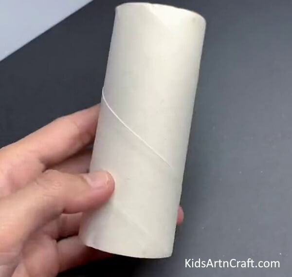 Crafting a Ladybug from a Toilet Paper Roll