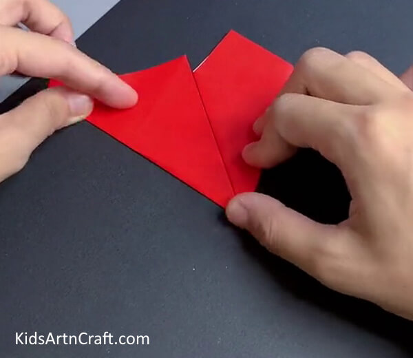 Folding The Left Corner Again- A Tutorial for an Origami Paper Star 