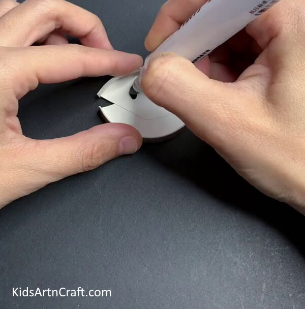 Drawing Eye of the fish with Marker- Assembling a Paper Cup Fish 