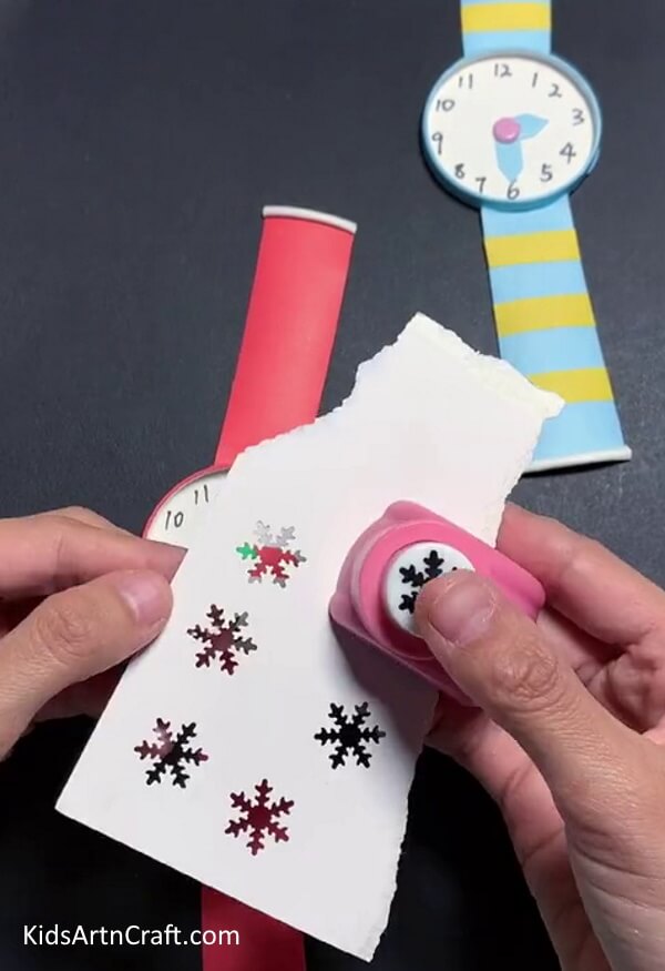 Punching Snowflakes - Instructions on Making a Wrist Watch Using Paper Cups for Kids 