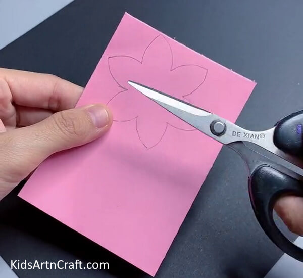 Cutting a Flower Shape-Step-by-step instructions on crafting a paper flower ring