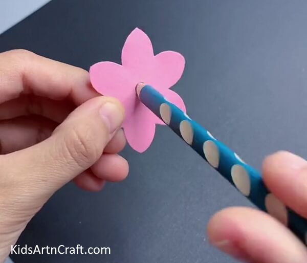 Making a Hole At The Center.-A simple guide to constructing a paper flower ring