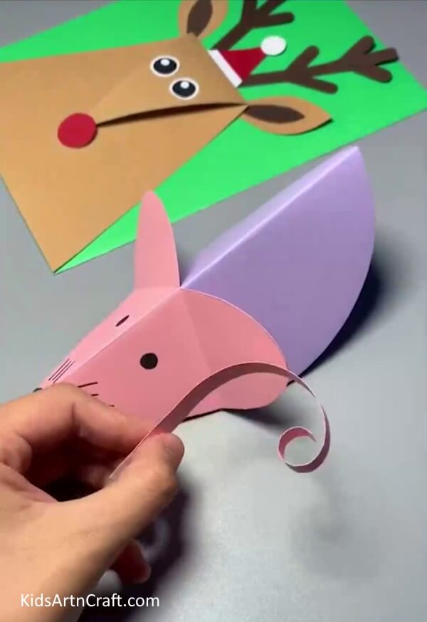 An instructional guide on making a paper mouse for children Making Tail