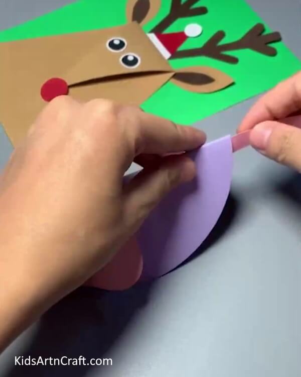Find out how to make a paper mouse craft for kids Pasting Tail
