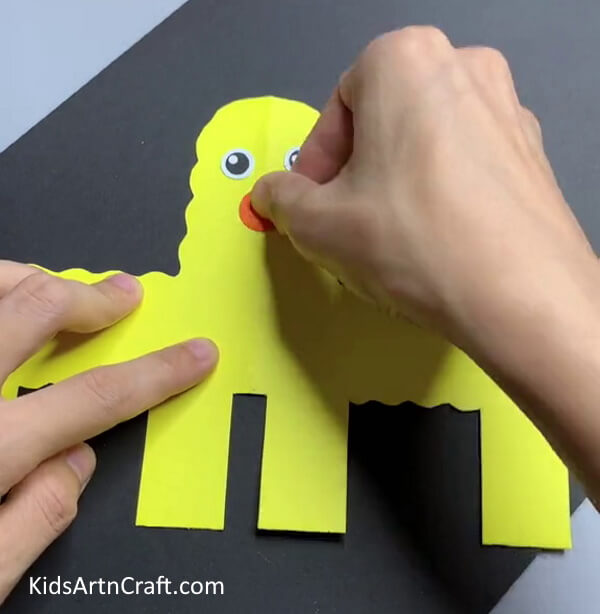 Making Mouth Of Sheep - A straightforward paper sheep design children can make.