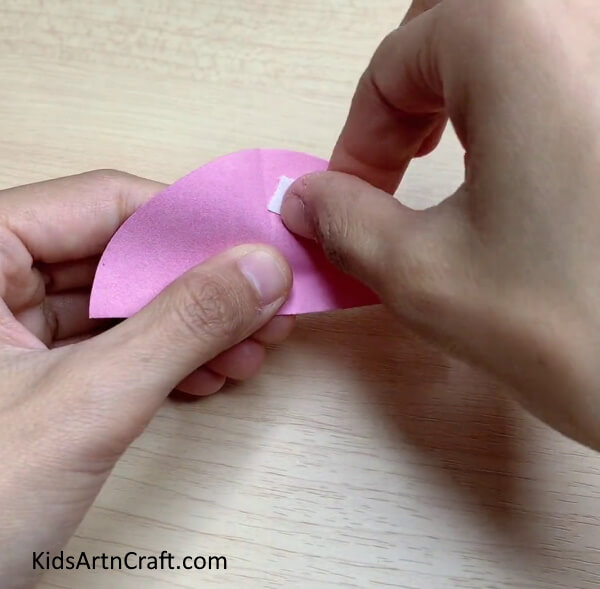 Pasting With Double Side Tape Step-by-Step Instructions on How to Make a Paper Umbrella Craft with Kids 