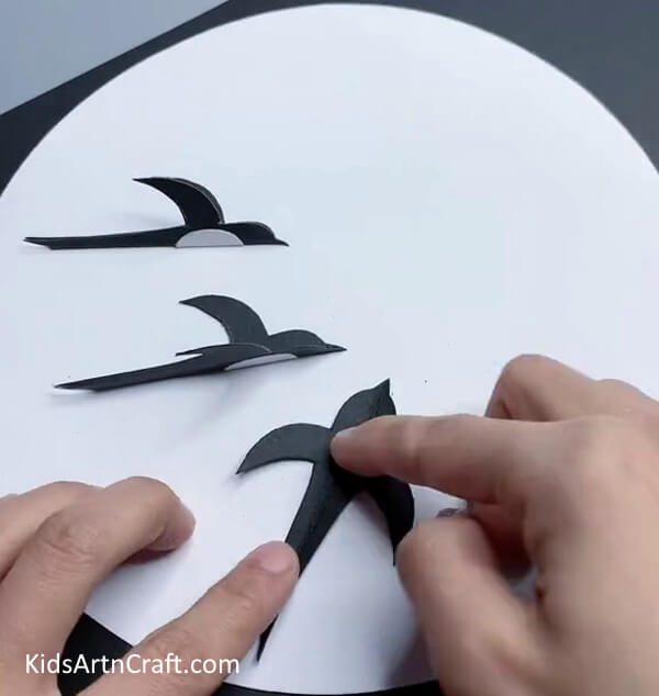 Pasting Third Bird On Craft - Guide to Building a Bird Artwork with Paper 