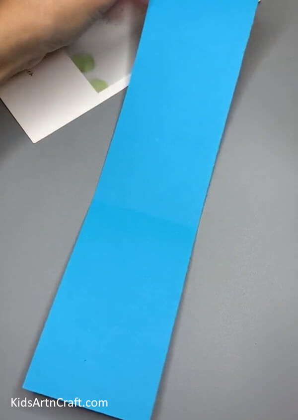 Cutting A Long Strip - How-to guide for creating a Blue Whale out of Paper