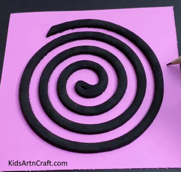 Placing Mosquito Coil On Paper - Tutorial for making a paper butterfly craft yourself