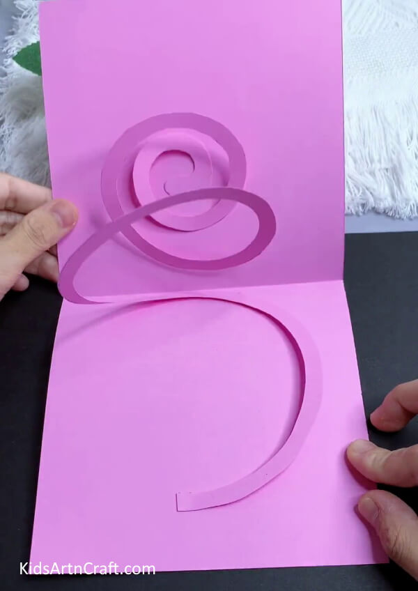Pasting Other End - Put together a paper butterfly craft with this tutorial