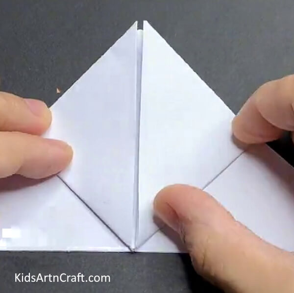 Folding Triangle Edges Upwards Educating Kids To Construct A Paper Rabbit 
