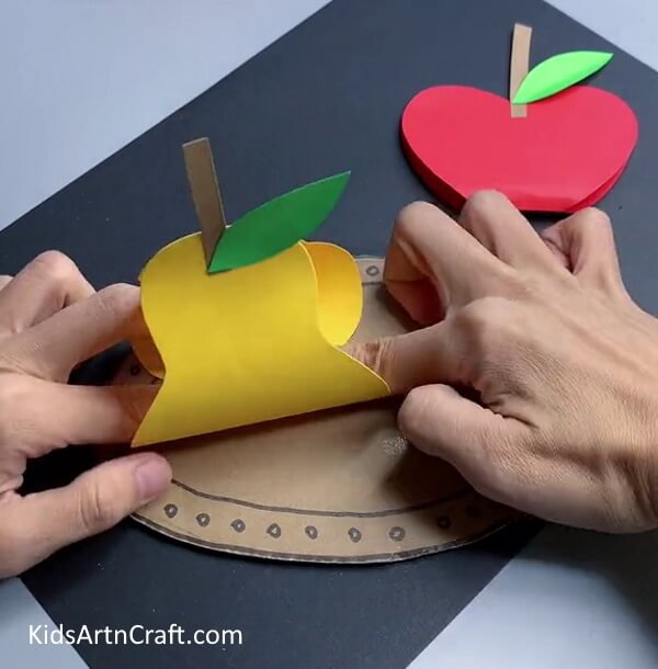 Pasting Fruits On Plate - Help your children construct 3D paper fruit crafts. 