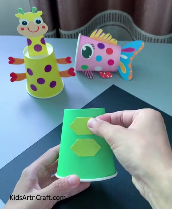 Cutting Hexagon With Scissors Master the steps of creating a simple Paper Cup Turtle that's great for kids. 