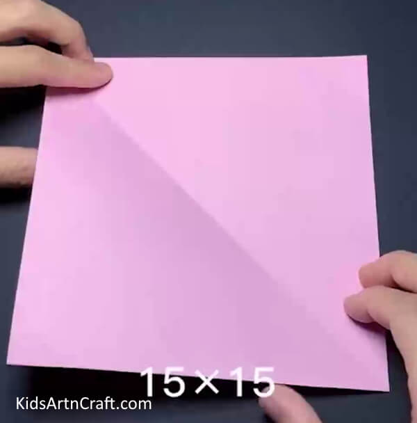 Folding The Pink Origami Sheet Craft an Origami Bunny Out of Yellow Paper Sun - Step by Step Guide for Children 