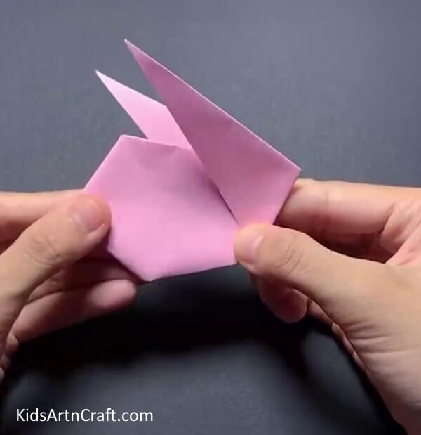 Folding The Rump Learn to Make an Origami Bunny with Yellow Paper Sun - A Step-by-Step Guide for Youngsters
