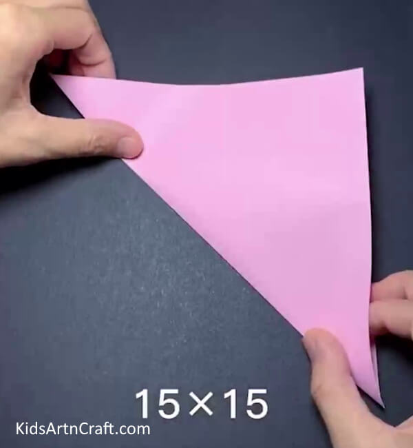 Second Diagonal Fold How to Make an Origami Bunny Using Yellow Paper Sun - A Step-by-Step Guide for Kids 